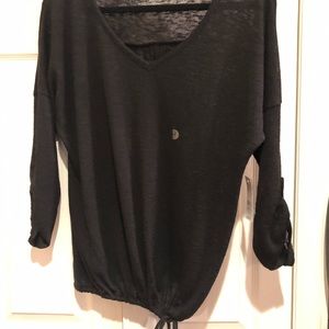 Black v neck sweater . Drawstring bottom